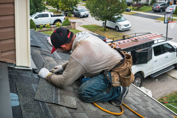 Professional Flat Roof Repair technician working in Troy, NH